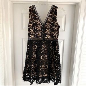 Francesca’s black sleeveless lace dress